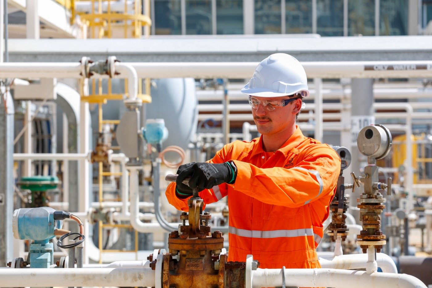 NETTS apprentice working at an energy facility