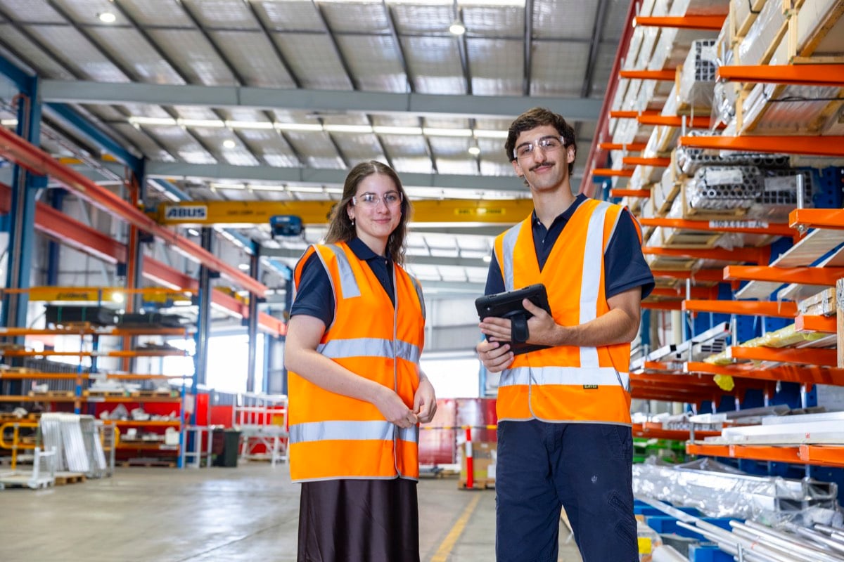 Two Programmed trainees on site in high-visibility workwear