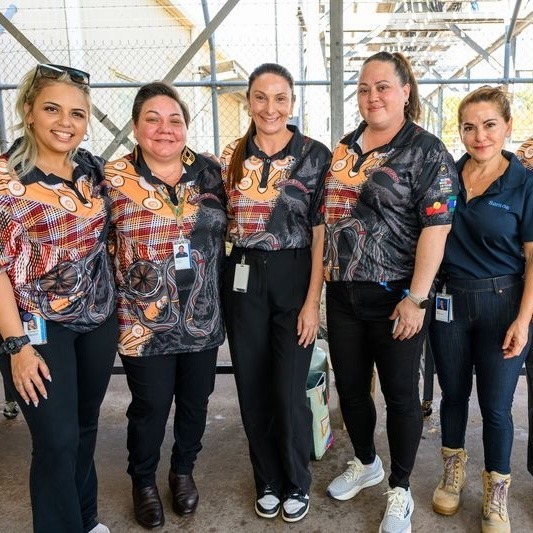 Programmed and Santos team members at a NAIDOC Week community event in Darwin