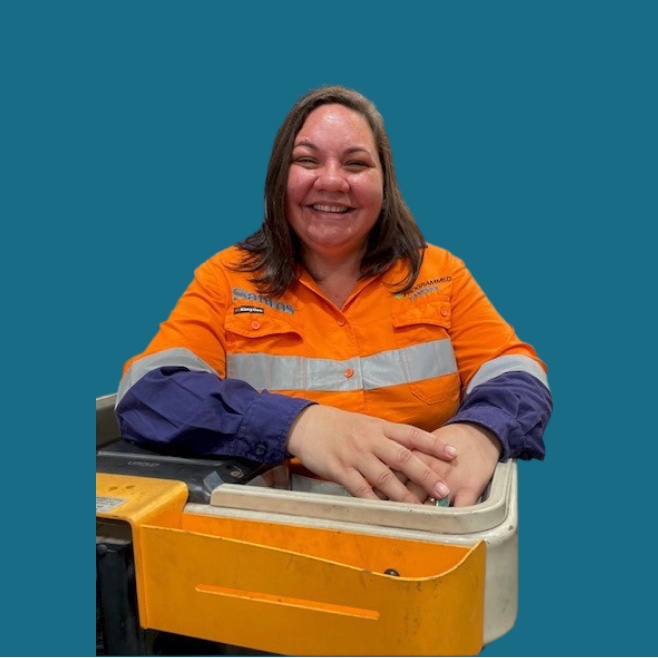 Smiling Programmed trainee in high-visibility workwear
